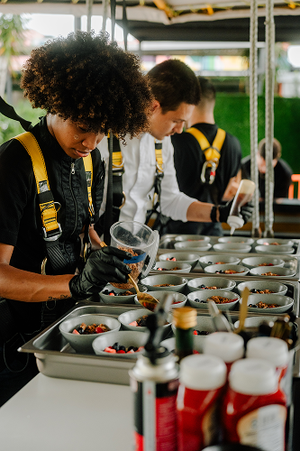 FlyDining chefs plating dishes on the sky table
