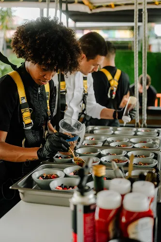 FlyDining chefs plating dishes on the sky table